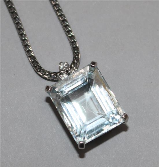 An aquamarine and diamond pendant, on 18ct white gold suspension chain, pendant 20mm.